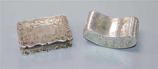 A late Victorian engraved silver concave snuff box by F.W Turton Ltd, Birmingham, 1897 and one other sliver snuff box.